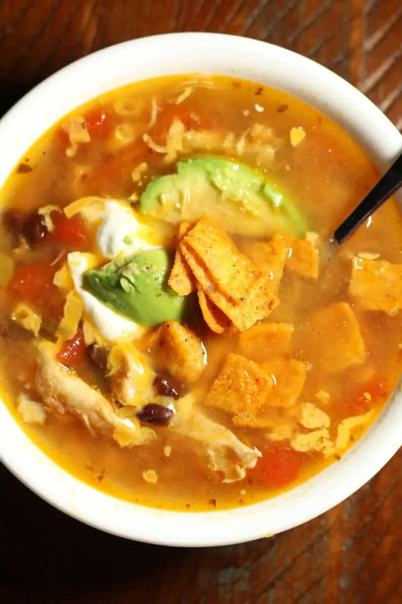 Dump and Go Chicken Taco Soup--an easy Instant Pot or slow cooker soup with tender shredded chicken, black beans, corn, tomatoes and green chiles.