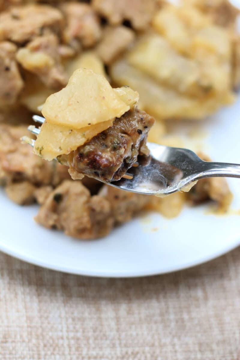 Slow Cooker Amish Beef and Potato Casserole--a crockpot meal with seasoned ground beef, sliced potatoes, and a creamy sauce for an easy weeknight dinner.