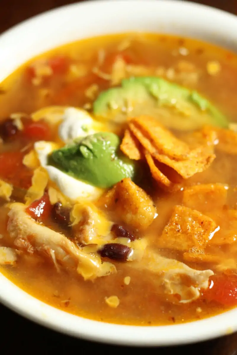 Dump and Go Chicken Taco Soup--an easy Instant Pot or slow cooker soup with tender shredded chicken, black beans, corn, tomatoes and green chiles.