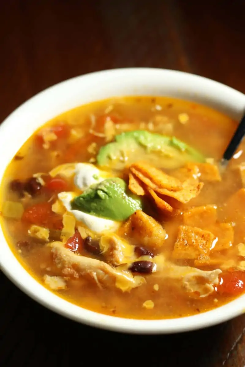 Dump and Go Chicken Taco Soup--an easy Instant Pot or slow cooker soup with tender shredded chicken, black beans, corn, tomatoes and green chiles.