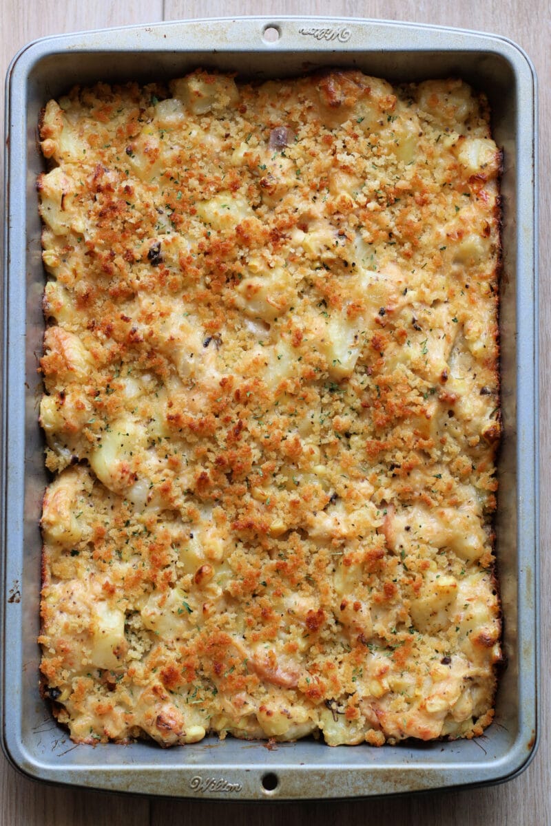 Pepper Jack Potato Casserole--a creamy, cheesy casserole made with tender potatoes, rotisserie chicken, sweet corn, pepper jack cheese and a crispy buttery panko topping.