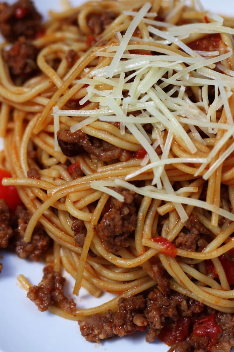 Cajun Inspired Dirty Spaghetti--an Instant Pot dinner with Italian sausage, ground beef, cajun seasoning, Rotel tomatoes, bell peppers, celery and spaghetti.
