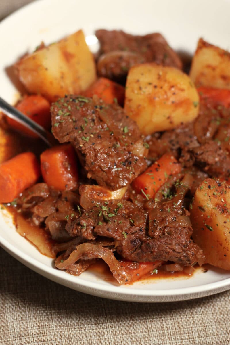 Chunky Beef Casserole--an easy crockpot or Instant Pot dinner made with tender beef, potatoes, carrots and onions. 