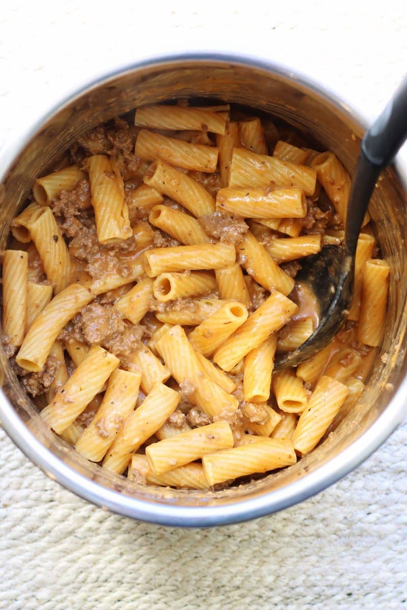 Creamy Parmesan Beef Rigatoni with Garlic Butter Sauce--an easy Instant Pot dinner made with seasoned ground beef, tender pasta, garlic and a creamy sauce.