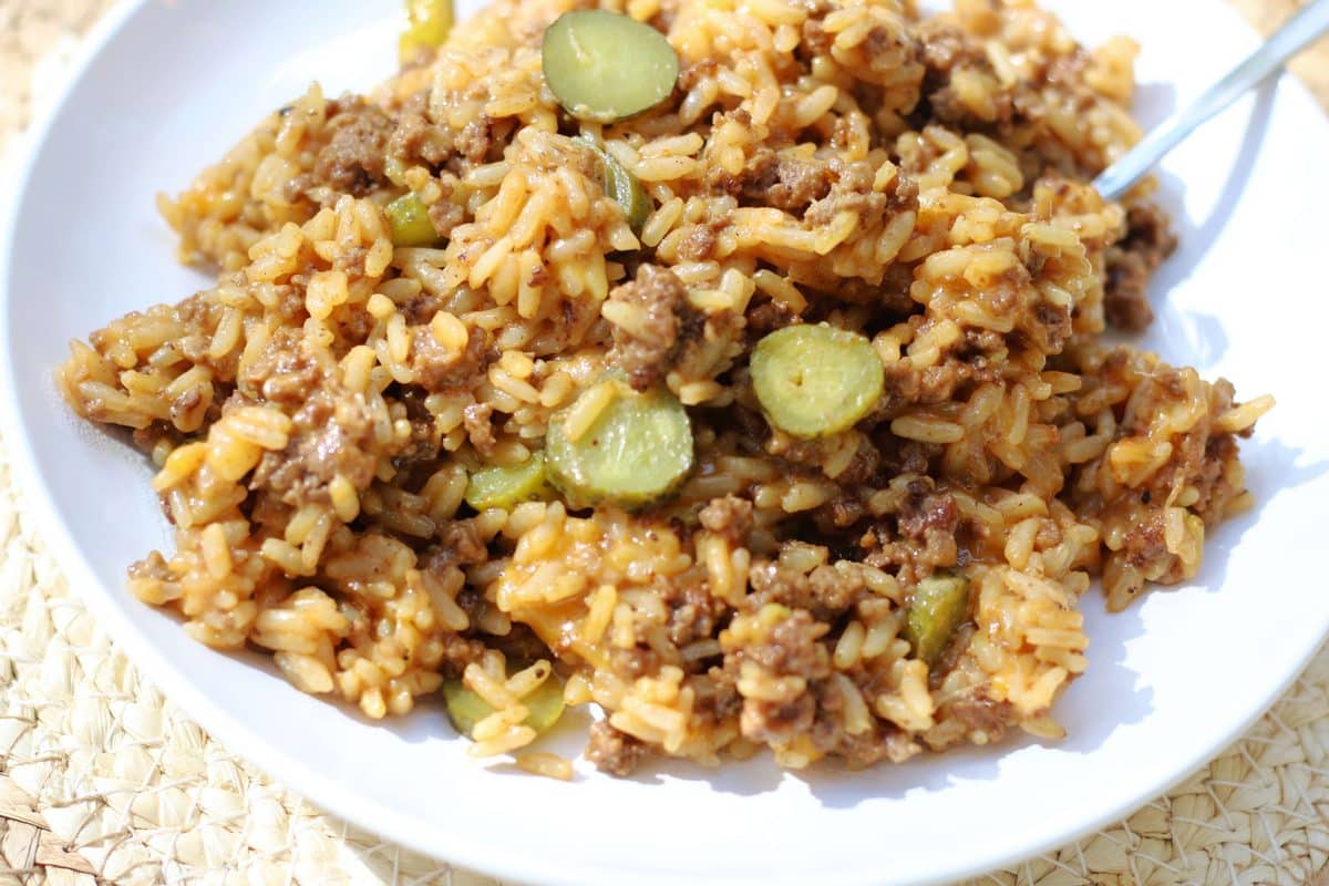 Loaded Cheddar Burger Rice Casserole--an easy Instant Pot dinner made with seasoned ground beef, rice, cheddar cheese, ketchup, mustard and dill pickle flavor.