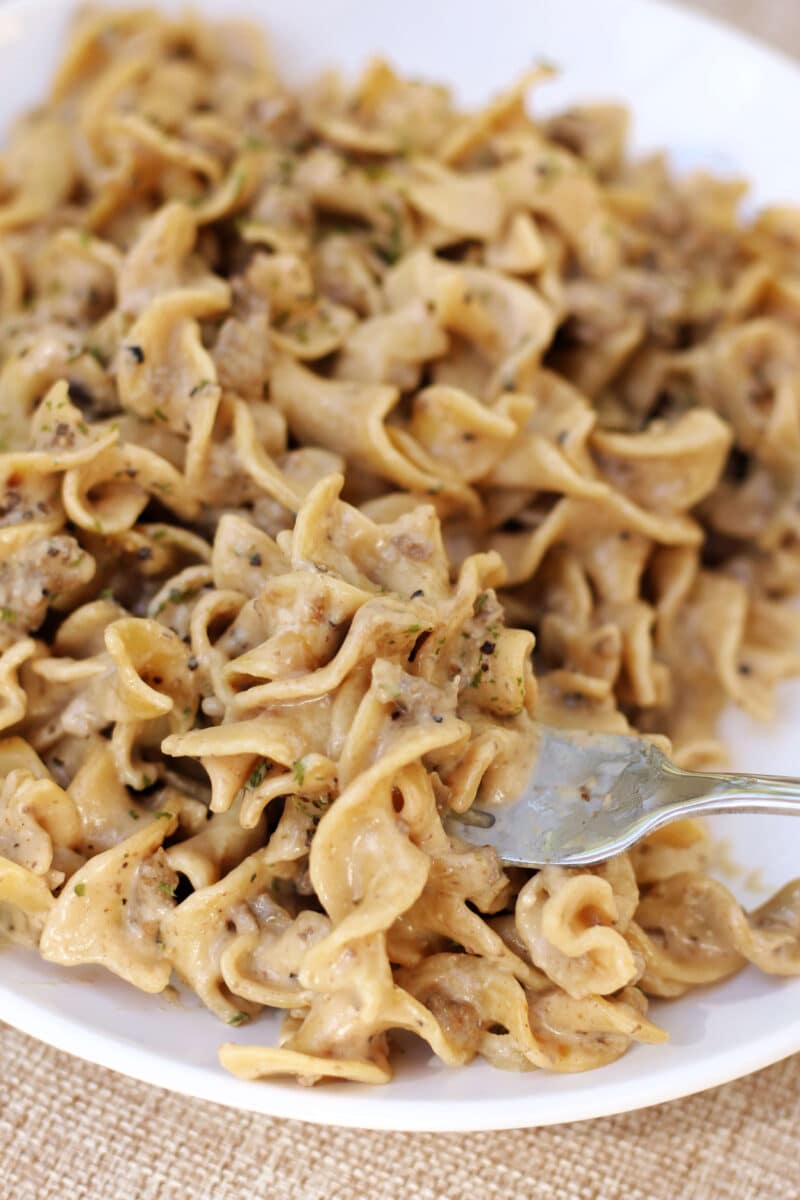 Navy Wife's Lazy Beef and Noodles--an easy Instant Pot dinner made with ground beef, tender egg noodles and a creamy brown gravy sauce.