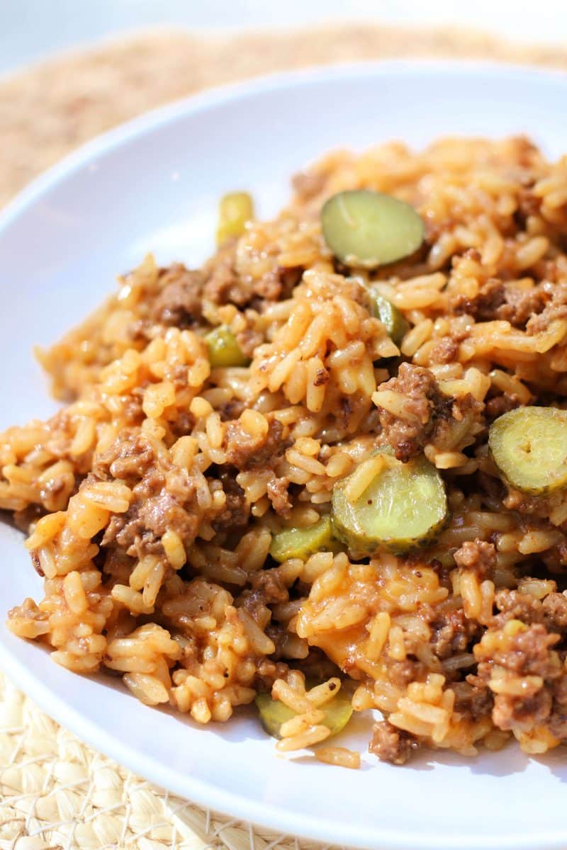 Loaded Cheddar Burger Rice Casserole--an easy Instant Pot dinner made with seasoned ground beef, rice, cheddar cheese, ketchup, mustard and dill pickle flavor.