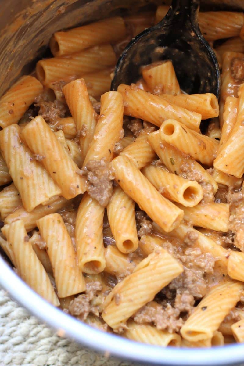 Creamy Parmesan Beef Rigatoni with Garlic Butter Sauce--an easy Instant Pot dinner made with seasoned ground beef, tender pasta, garlic and a creamy sauce.
