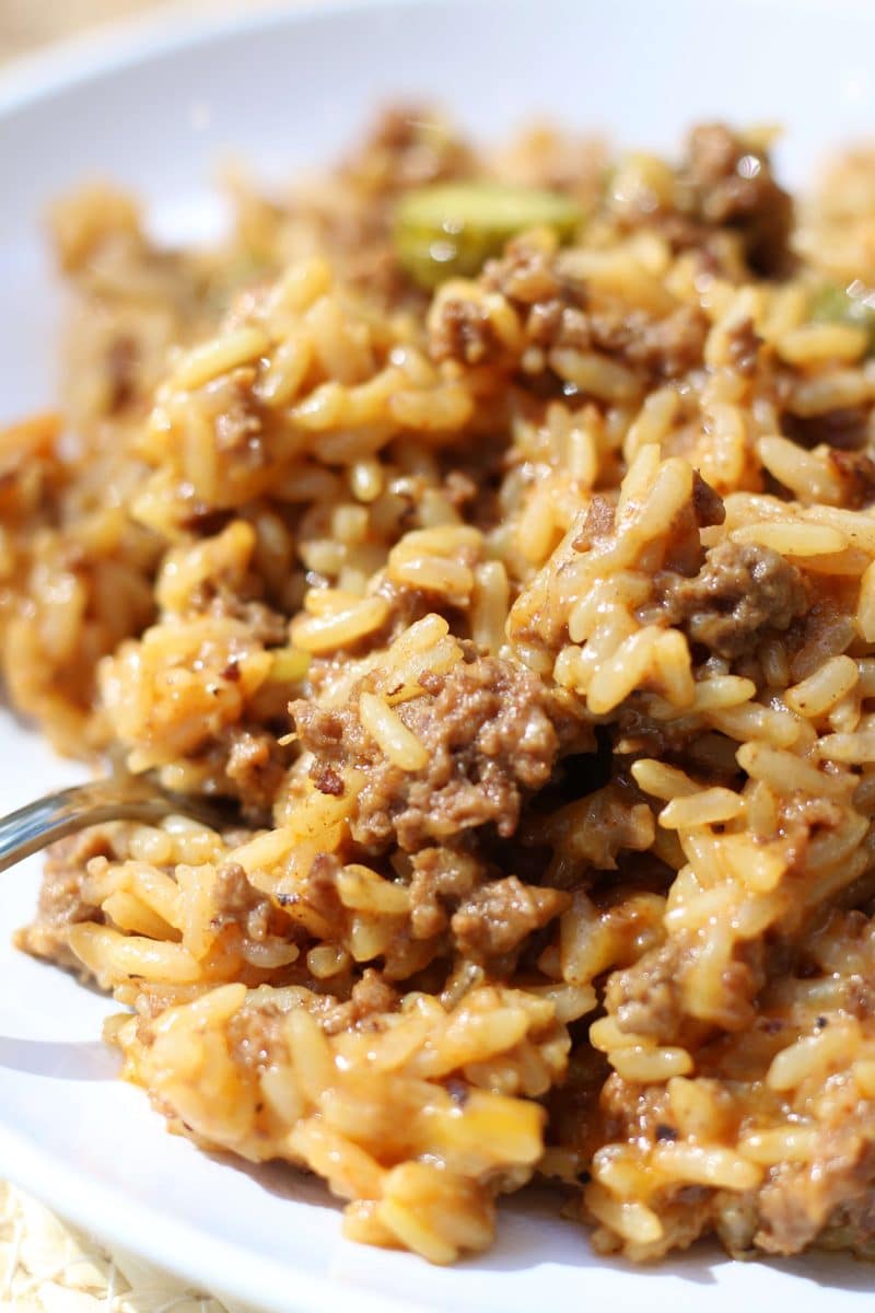 Loaded Cheddar Burger Rice Casserole--an easy Instant Pot dinner made with seasoned ground beef, rice, cheddar cheese, ketchup, mustard and dill pickle flavor.