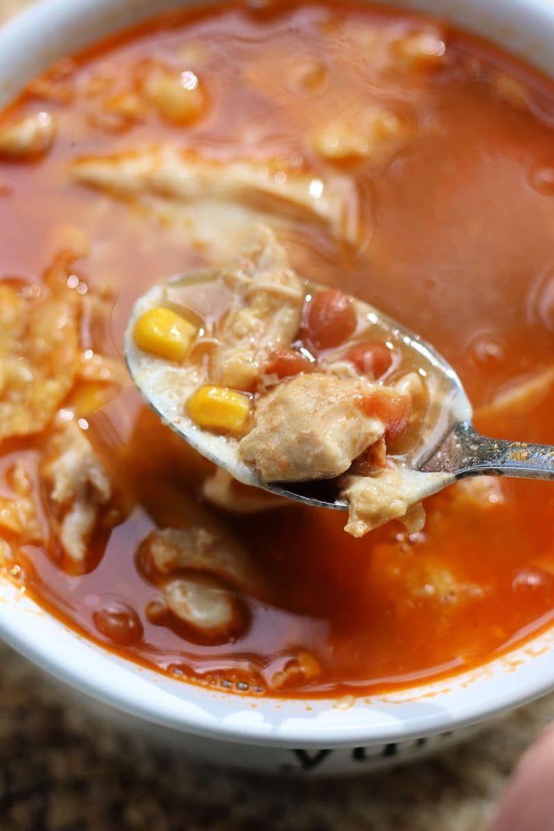 BBQ Chicken Soup--an easy Instant Pot or slow cooker chicken soup made with tender shredded chicken, ranch-style beans, corn, barbecue sauce and crunchy tortilla chips.