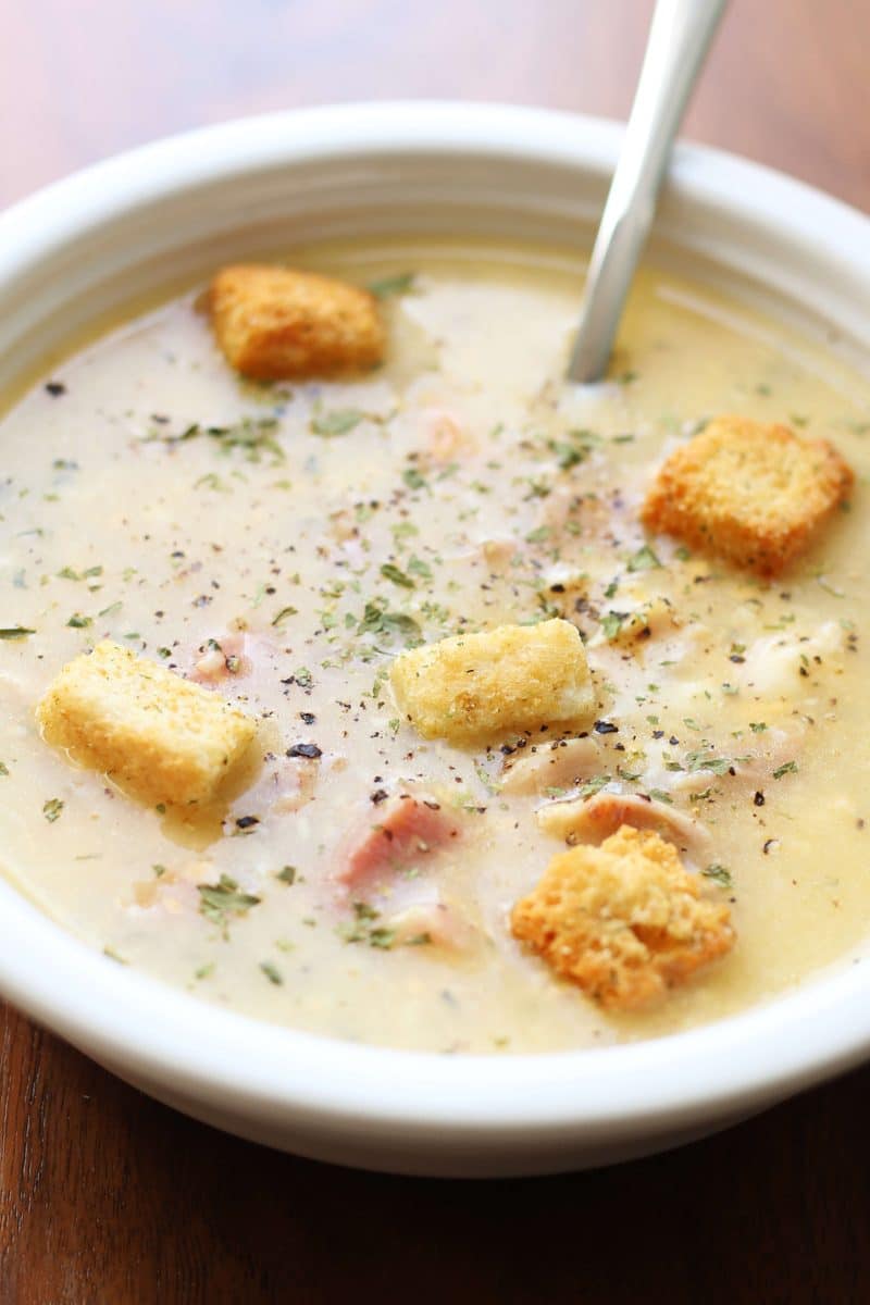 Monte Cristo Soup--an Instant Pot cheesy soup made with ham, turkey or chicken, Swiss cheese, cheddar and Dijon mustard, then topped with crunchy croutons and raspberry preserves.