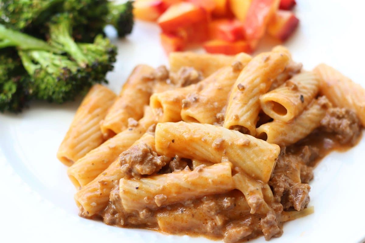 Creamy Parmesan Beef Rigatoni with Garlic Butter Sauce--an easy Instant Pot dinner made with seasoned ground beef, tender pasta, garlic and a creamy sauce.