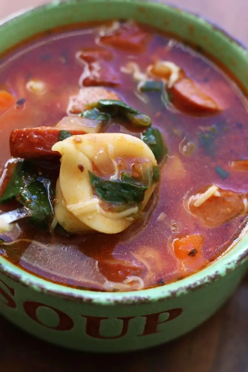 A flavorful soup made with beef smoked sausage, cheese tortellini, mushrooms, carrots, spinach and tomatoes. Make it in the Instant Pot or slow cooker for an easy family dinner!