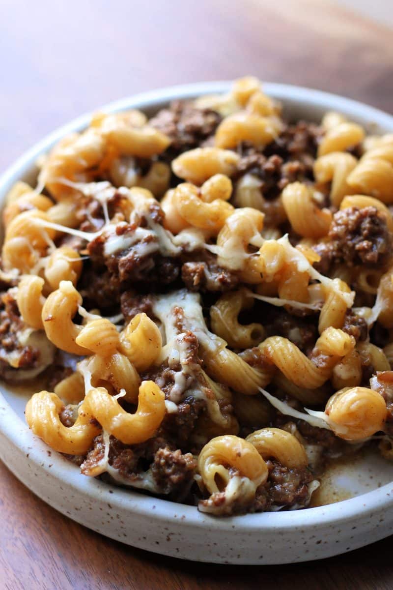 French Onion Ground Beef Pasta Gratin--an easy Instant Pot meal made with ground beef, tender pasta, French onion soup, thyme and melted Gruyere cheese for a comforting French onion soup inspired pasta dinner.