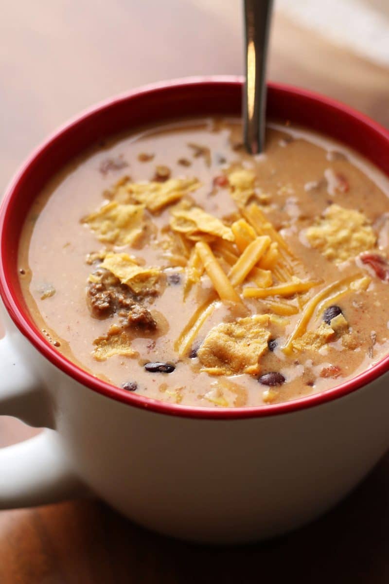 Southern Santa Fe Ground Beef Soup--an easy soup made with ground beef, black beans, pinto beans, corn, Rotel tomatoes, ranch seasoning and cream cheese for a rich and flavorful taco-inspired soup.