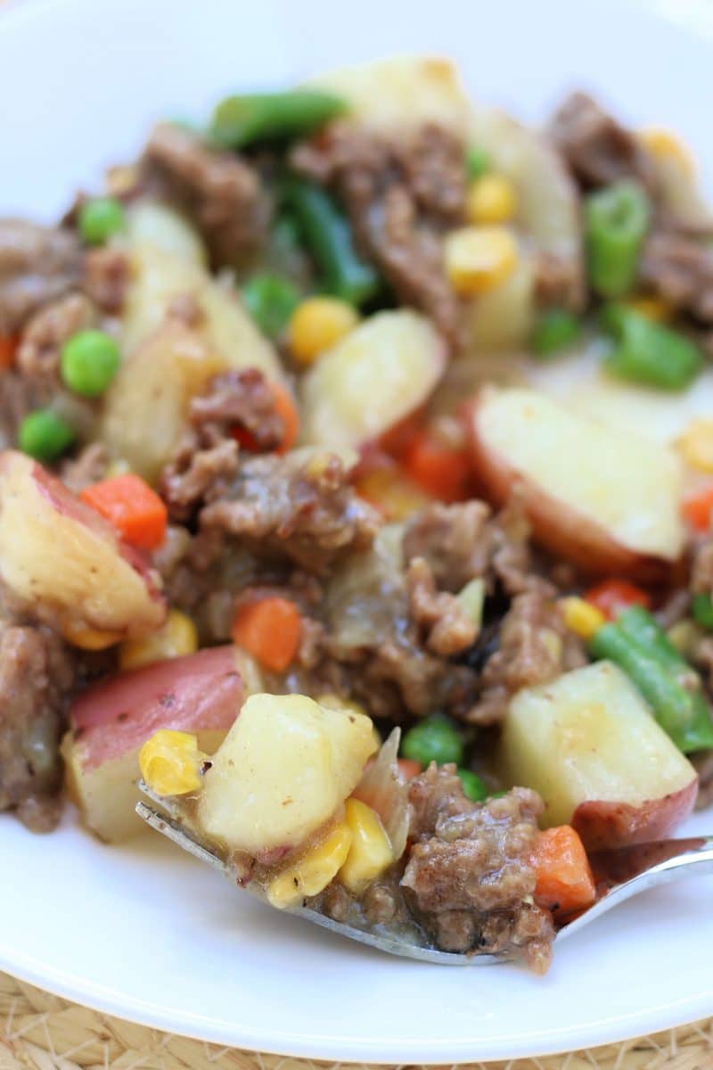 Country Beef Potato Gravy Casserole--a fast and easy Instant Pot or slow cooker dinner of seasoned ground beef, tender red potatoes, mixed vegetables and a savory chicken gravy that brings everything together.