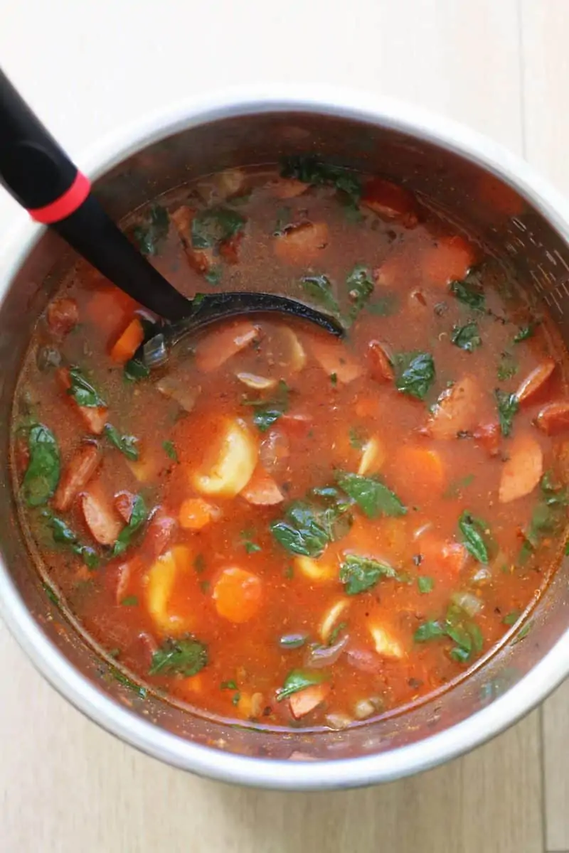 A flavorful soup made with beef smoked sausage, cheese tortellini, mushrooms, carrots, spinach and tomatoes. Make it in the Instant Pot or slow cooker for an easy family dinner!