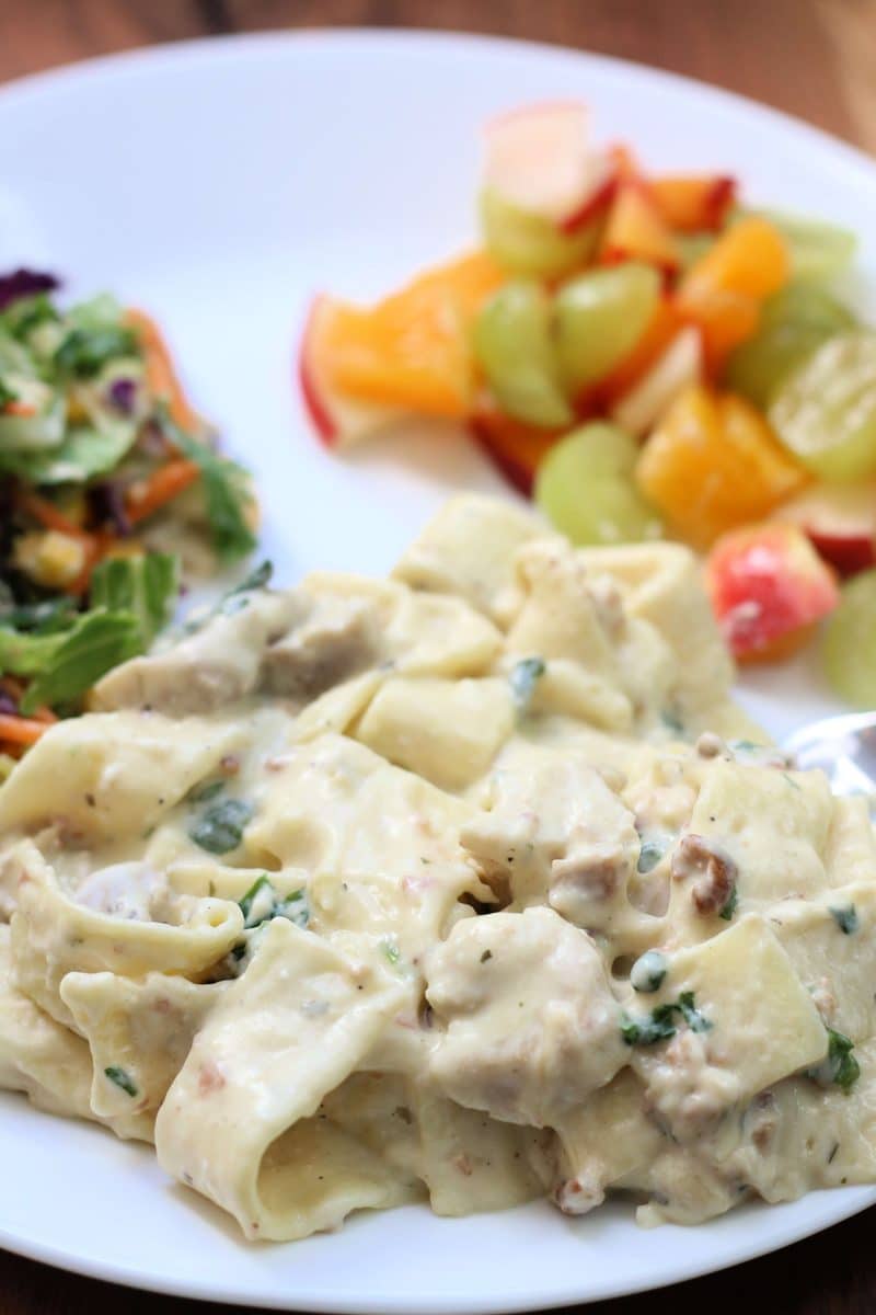 The Crazy Amazingly Good Casserole--an easy Instant Pot dinner made with tender chicken, wide noodles, bacon, ranch seasoning, spinach and a creamy parmesan sauce.