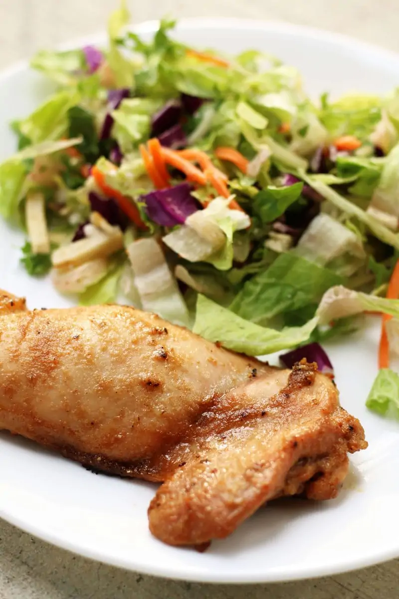 Tender, juicy oven-baked chicken thighs marinated in soy sauce, sesame oil, garlic, ginger, lemon juice and brown sugar for an easy, flavorful chicken dinner.