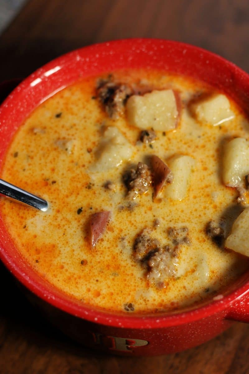 Cheesy Beef and Potato Soup--an easy soup made with ground beef, tender red potatoes and cheddar cheese in a creamy broth. Make it in the Instant Pot or slow cooker.