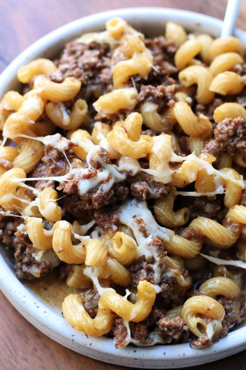French Onion Ground Beef Pasta Gratin--an easy Instant Pot meal made with ground beef, tender pasta, French onion soup, thyme and melted Gruyere cheese for a comforting French onion soup inspired pasta dinner.